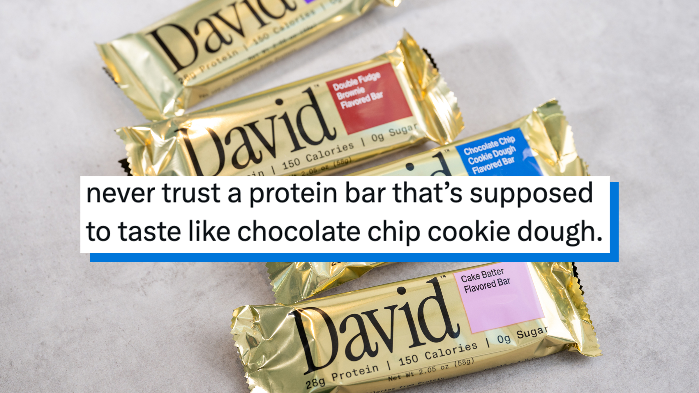 4 different flavors of David Protein bars laying on a white background. Tweet text overlay reads, "never trust a protein bar that’s supposed to taste like chocolate chip cookie dough."