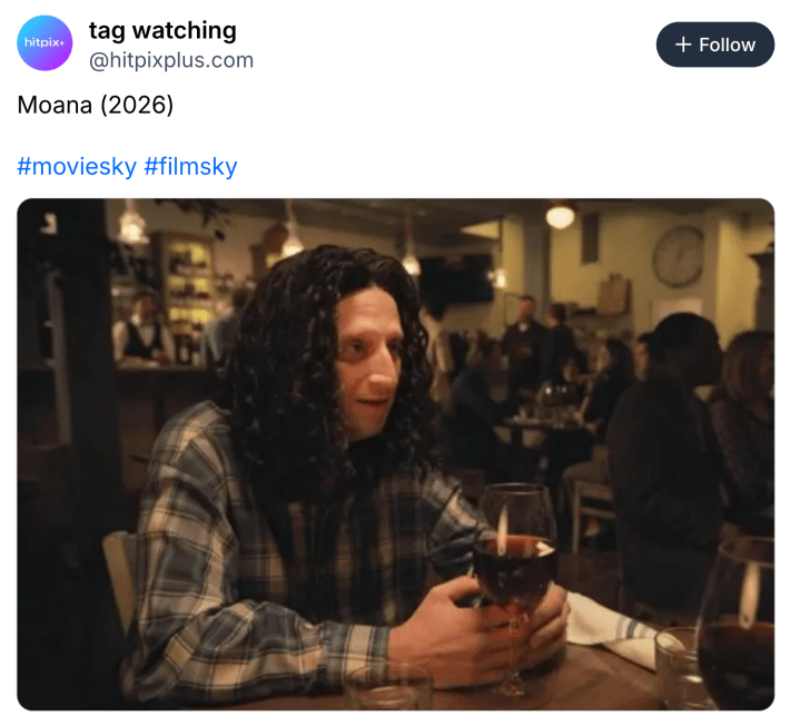 Screencap of a white guy in a big curly wig sitting in a bar with a glass of wine. Text reads, "Moana (2026)"