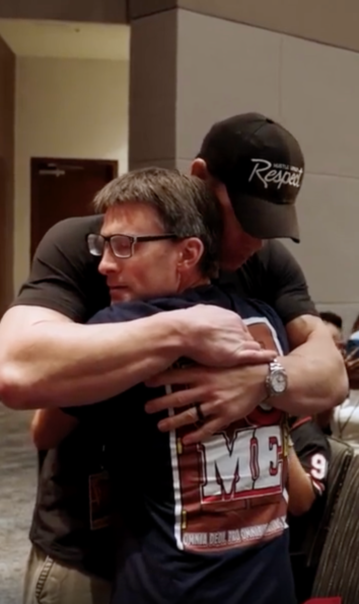 @MegaConOrlando/X John Cena hugging a fan with stage four cancer