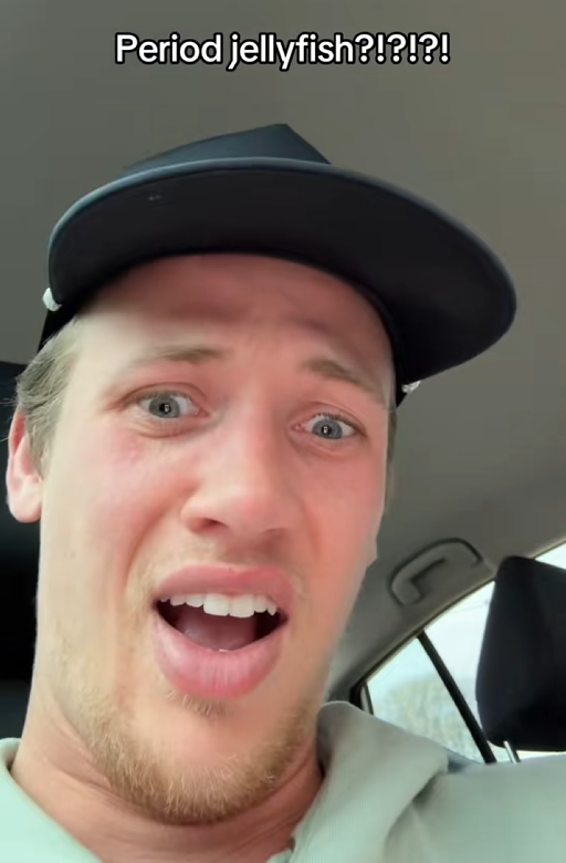 TikTok video of a man making a shocked face for the camera with a caption reading "Period jellyfish?!?!?!"