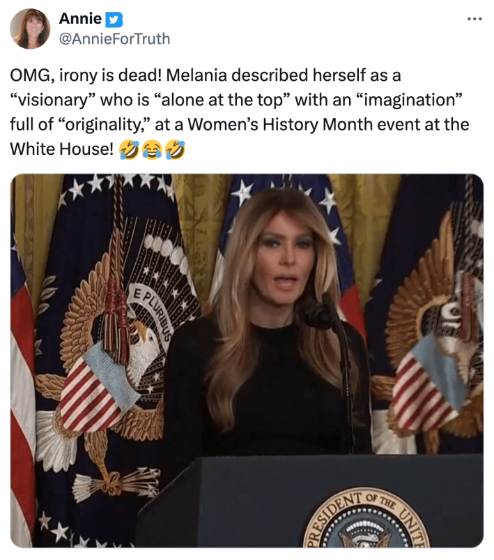Tweet mocking Melania Trump calling herself a "visionary" with an image of her standing at a podium in front of ornate flags.