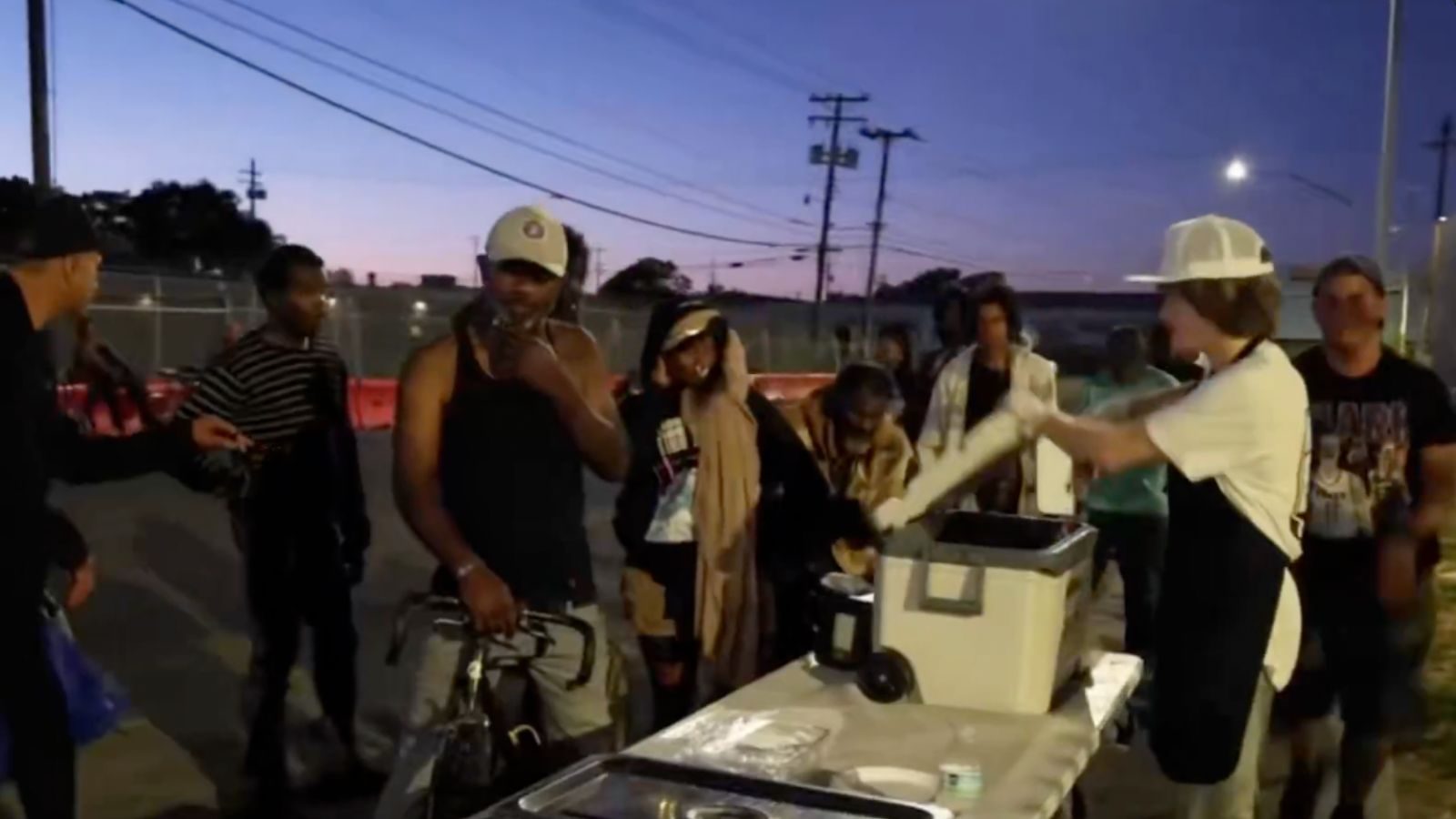 Video Shows Kr3w Kali Shoved While Feeding Homeless People