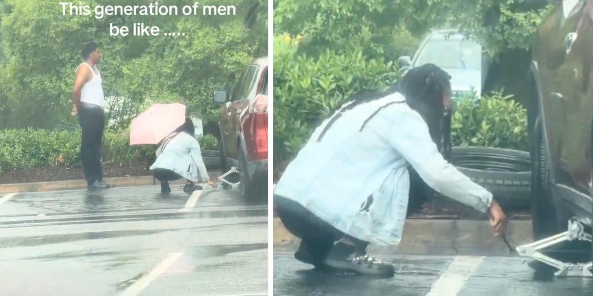 Woman repairs car in rain while man sits n car