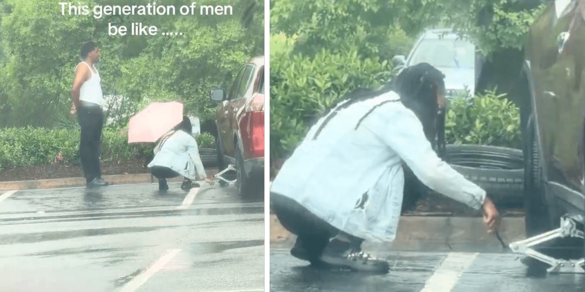 Woman repairs car in rain while man sits n car