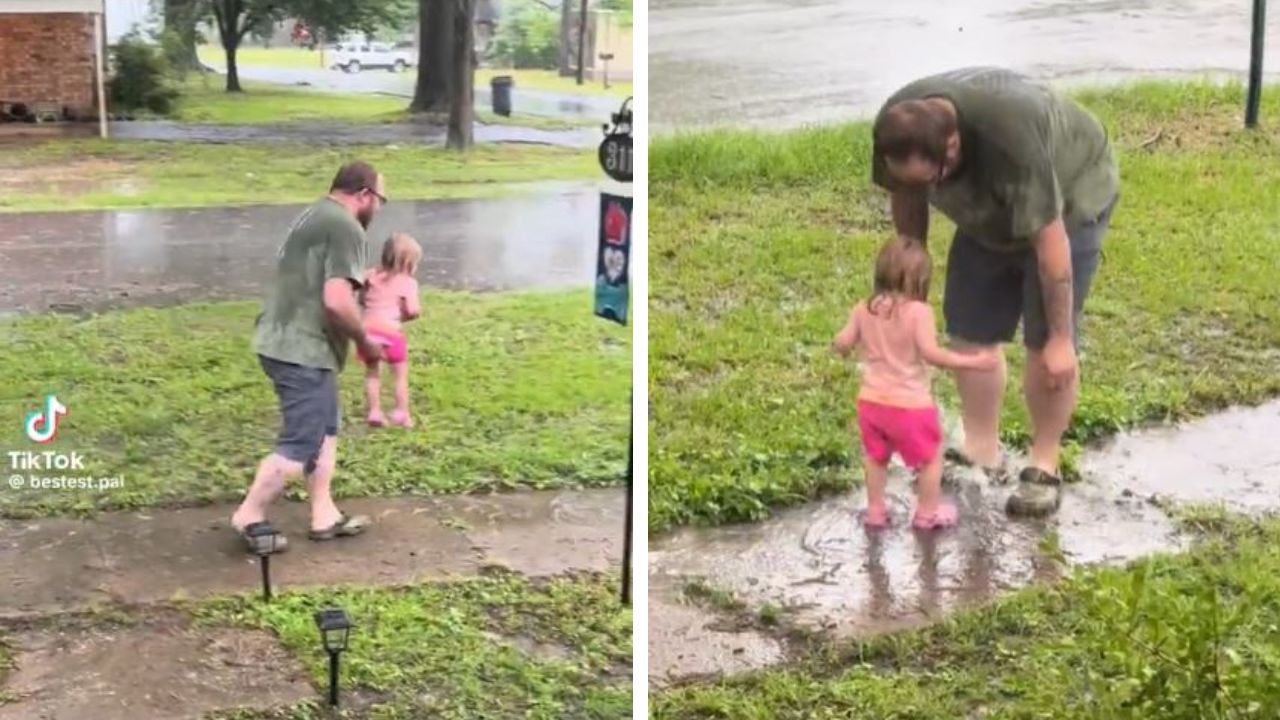 Dad plays with toddler in the rain
