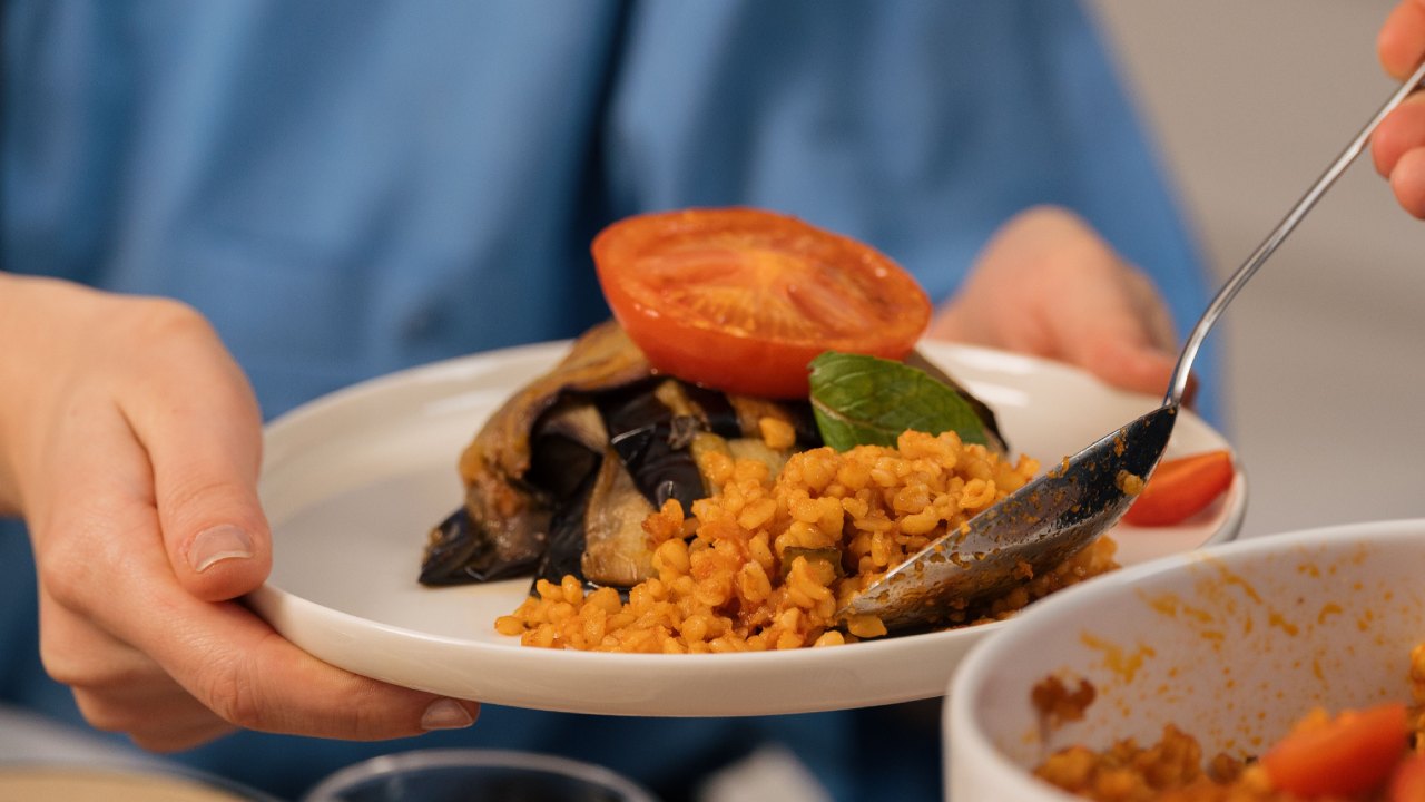 A vegetarian dish being served.