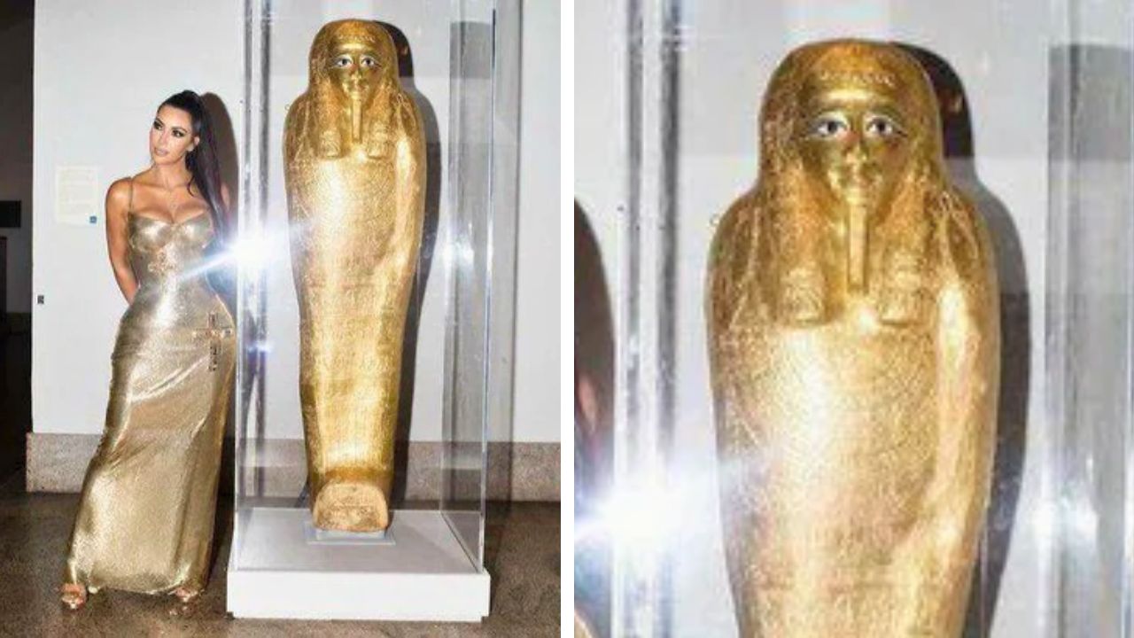 Kim Kardashian at the 2018 Met Gala in a Versace gown near the coffin of Nedjemankh.