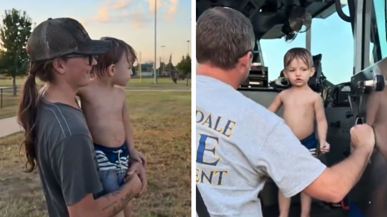 A firefighter helps a 3-year-old explore a fire truck after his birthday party had no guests.
