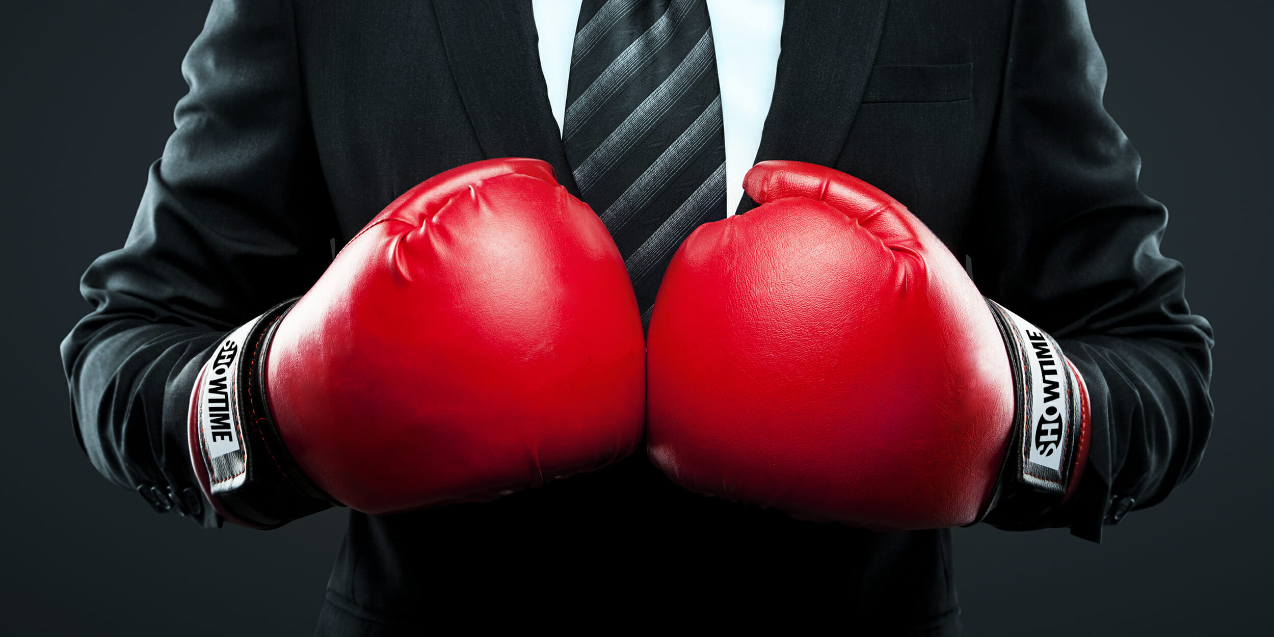 businessman in boxing gloves
