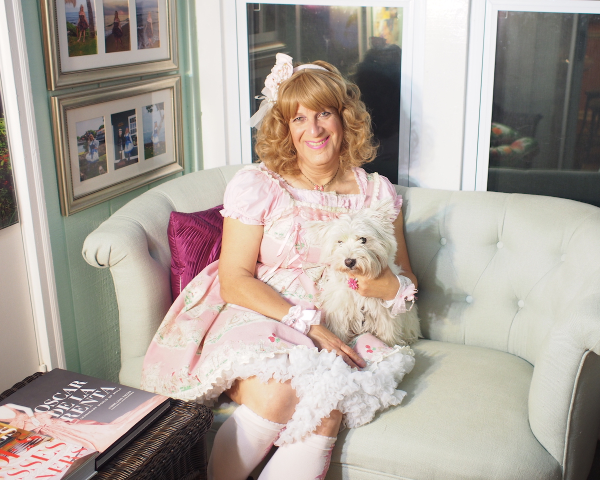 Baker in her reading nook with her dog, Sophie