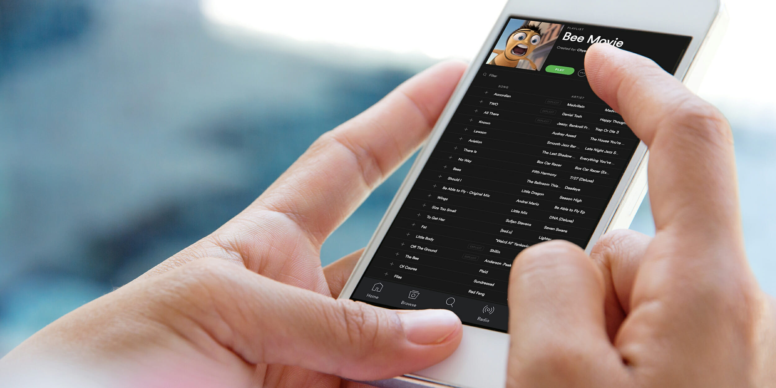 Woman playing Bee Movie Spotify playlist