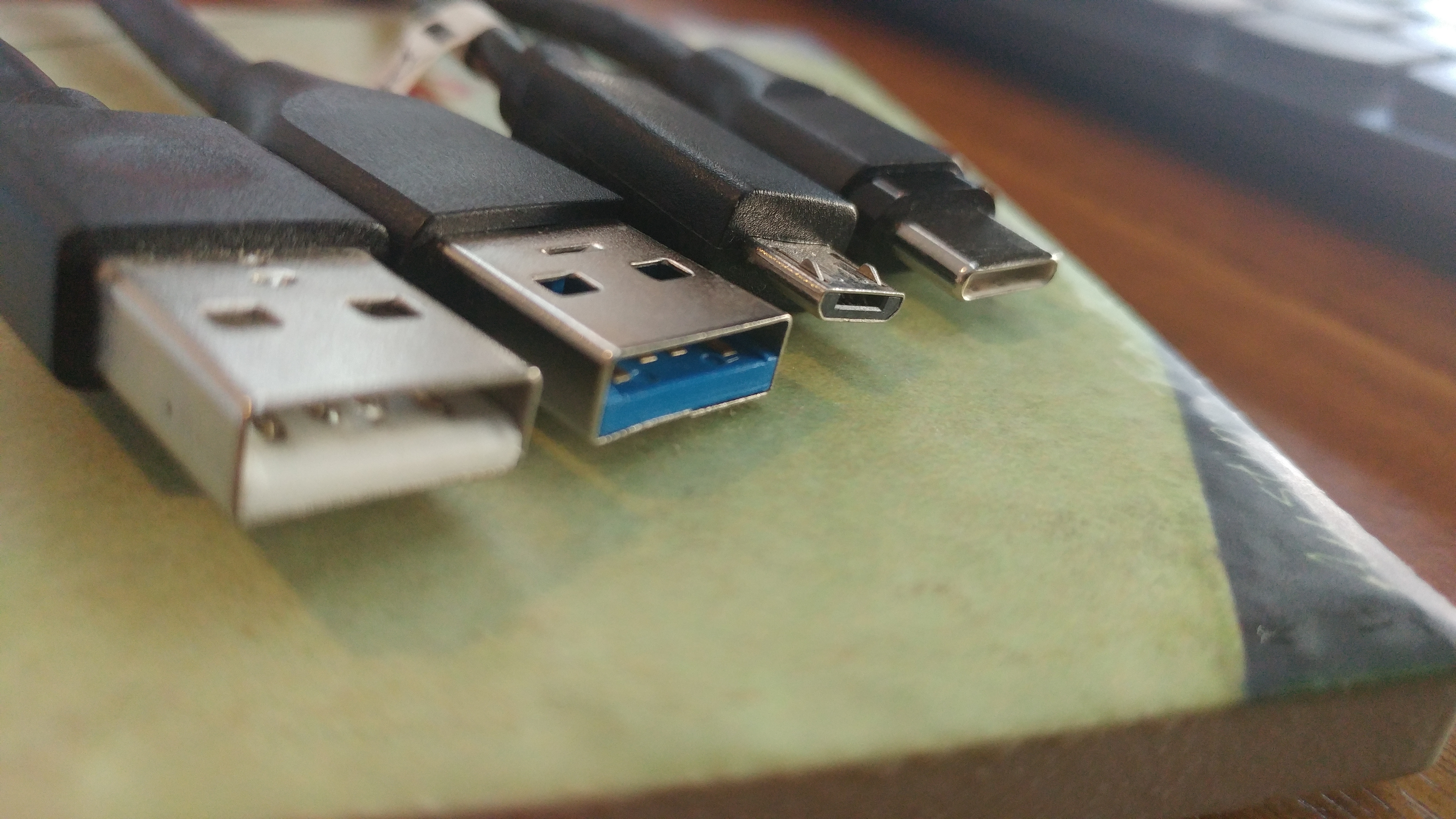From left to right: USB-A (2.0), USB-A (3.0), micro-USB, USB-C