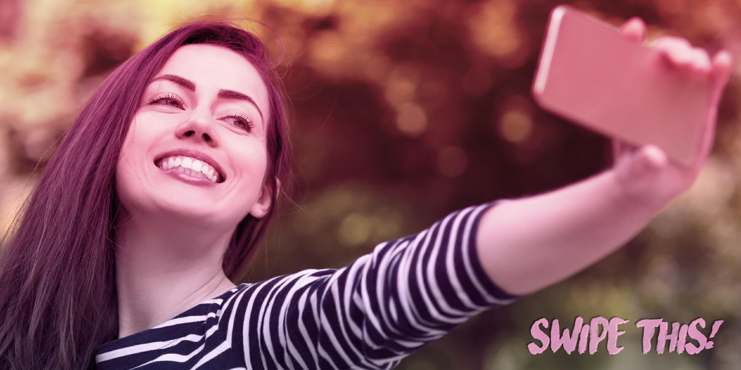 Smiling woman taking a selfie