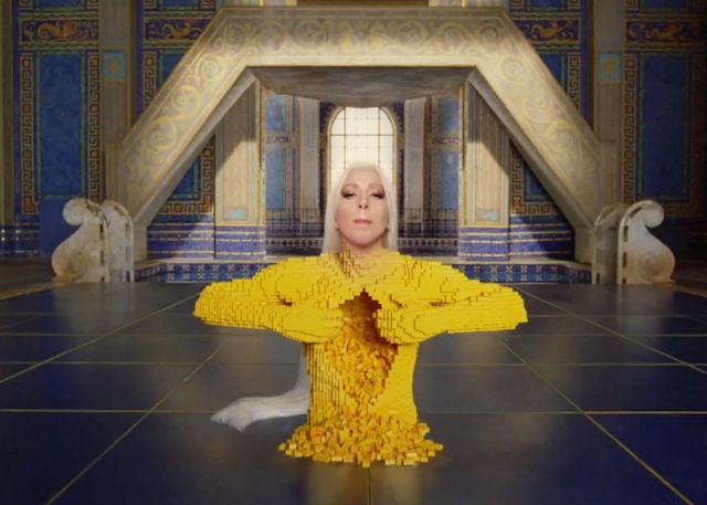 Lady Gaga with her head superimposed on a Lego sculpture