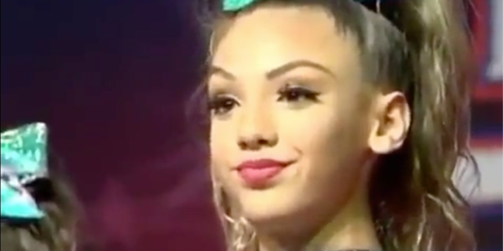 'Big mood' cheerleader smirk.